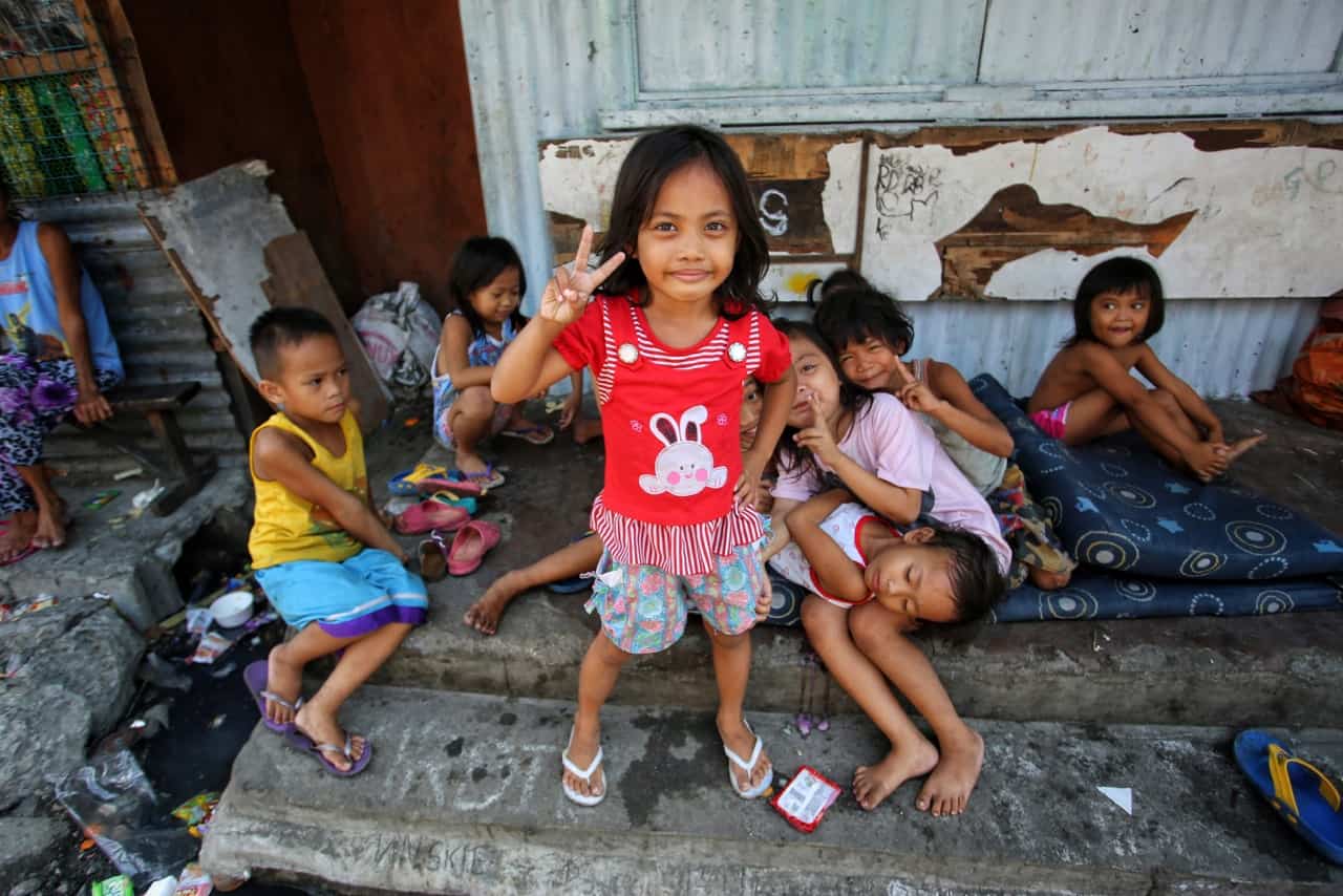 Children are everywhere in the slums of Manila. Prenatal care is almost nonexistent and treatment for routine ailments is often not sought. School, however, is mandatory and parents make sure their children have an education. There is a day care center in the Happyland slum where children are taught basic math, writing and English. 