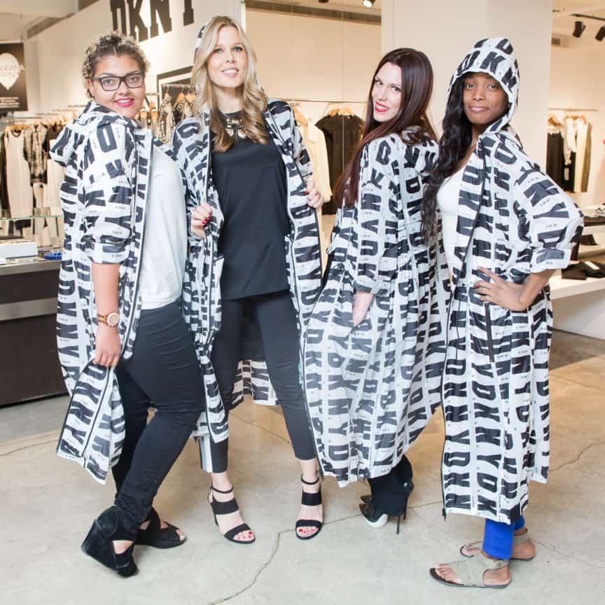 Tay and LeeAnn meet Mary Alice for a fitting at the DKNY flagship store in New York City. Danielle Vreeland and Aliza Licht from DKNY donated head-to-toe looks for the girls. DKNY opened up their store for this special Make-A-Wish GLAM4GOOD fitting! Here Mary Alice, LeeAnn, Danielle and Tay are hamming it up in DKNY trench coats.